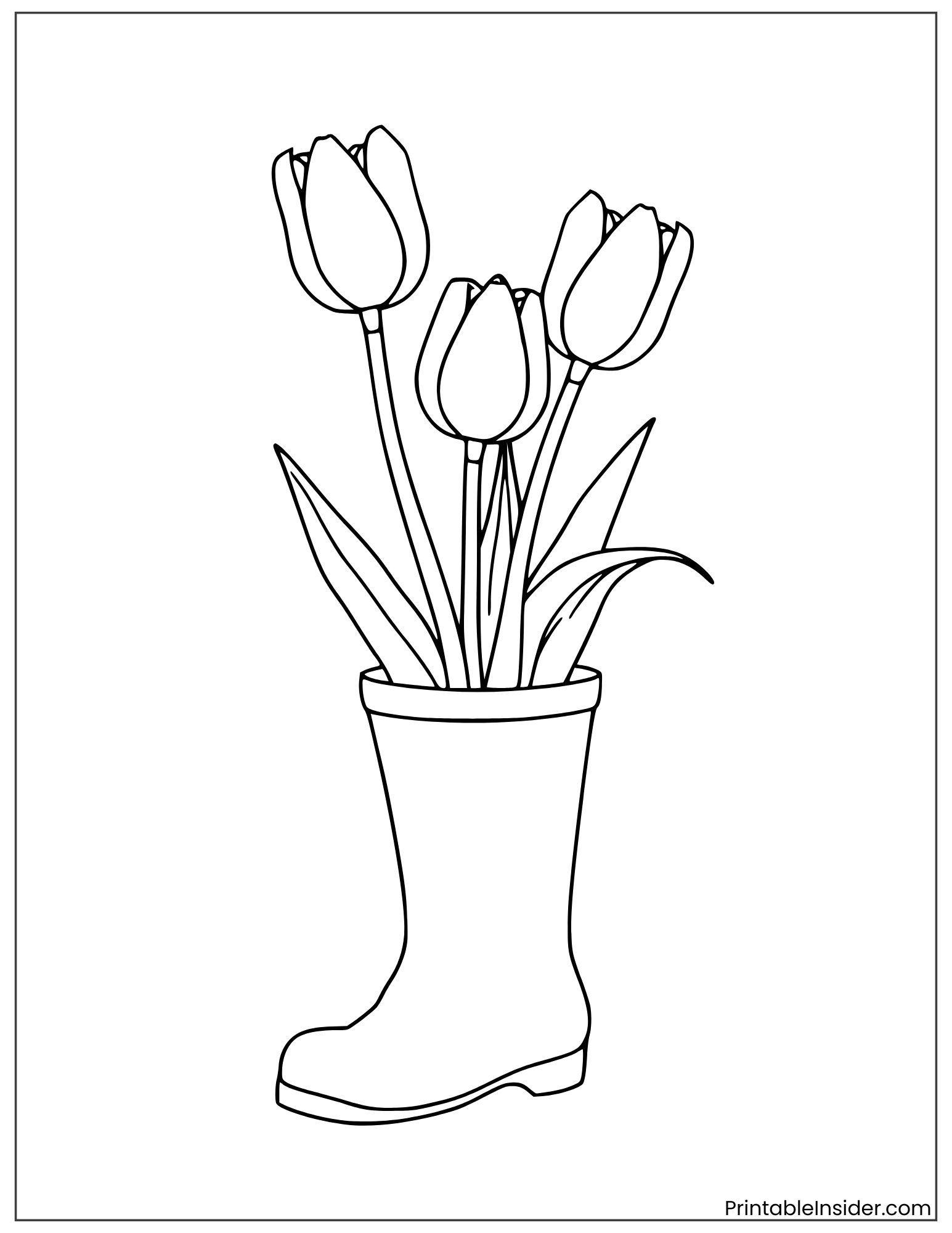 tulip flowers growing from a boot